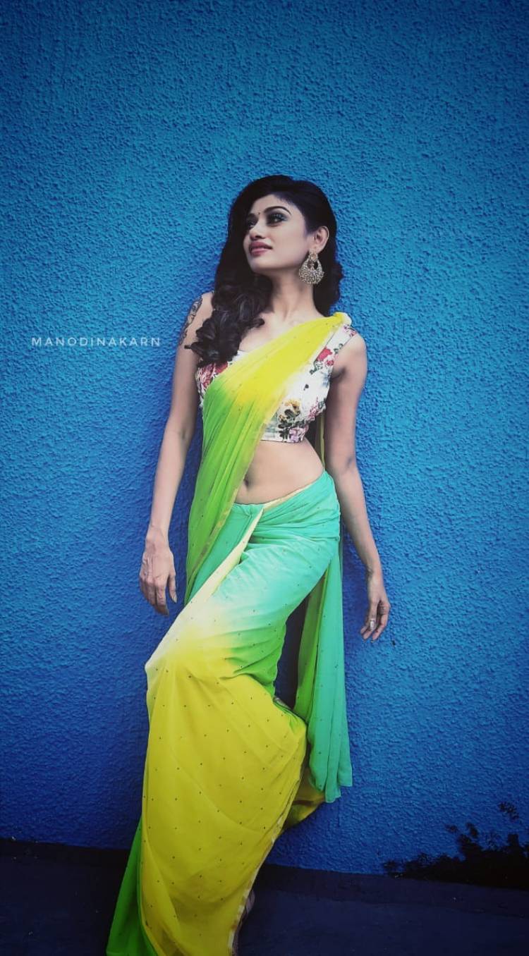 Actress #Oviya looks resplendent in the colourful saree… Here take a look at the stills from her latest photoshoot.