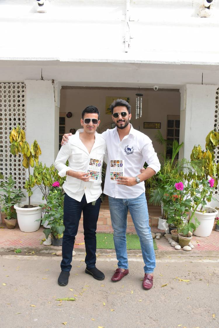 Author Devir Singh Bhandari Presenting the Yuva Bharat Book to Harmeet Singh (Meet Bros)