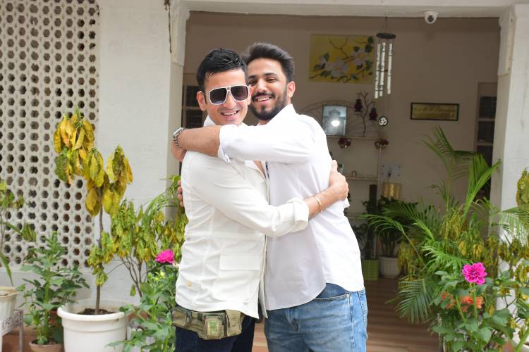 Author Devir Singh Bhandari Presenting the Yuva Bharat Book to Harmeet Singh (Meet Bros)